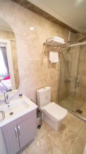 Koupelna v ubytování DYMAR HOTEL