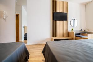 Postel nebo postele na pokoji v ubytování Villa Catalpa