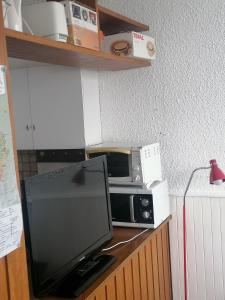 Een keuken of kitchenette bij résidence campbielh 1