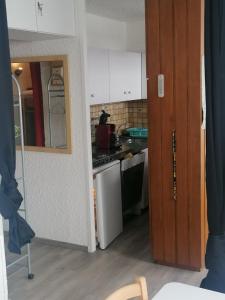 Een keuken of kitchenette bij résidence campbielh 1