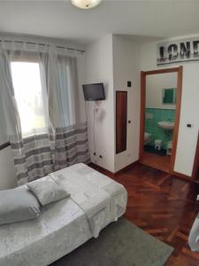 Letto o letti in una camera di Il Pagio