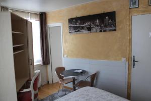 Postel nebo postele na pokoji v ubytování Hotel du Gambrinus
