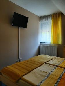 Posteľ alebo postele v izbe v ubytovaní Major család apartman