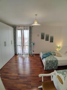 Letto o letti in una camera di Il Pagio