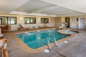 a large swimming pool in a house at Comfort Inn & Suites Tooele-Salt Lake City in Tooele