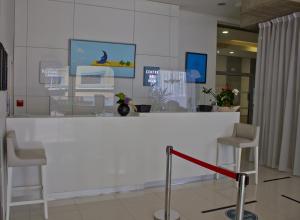 Лобби или стойка регистрации в Kyriad Prestige Perpignan Centre del Mon