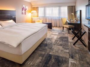 Voodi või voodid majutusasutuse Mercure Hotel Hamm toas