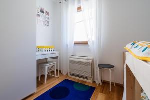 Łóżko lub łóżka w pokoju w obiekcie Downtown Apartment Helena
