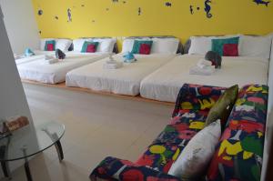Letto o letti in una camera di Nandian Homestay