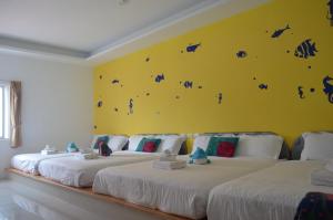 Letto o letti in una camera di Nandian Homestay