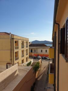 a view of a street from an apartment building at Capo Figari 9, appartamento a Golfo Aranci in Golfo Aranci