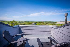 Ein Balkon oder eine Terrasse in der Unterkunft Mandalay