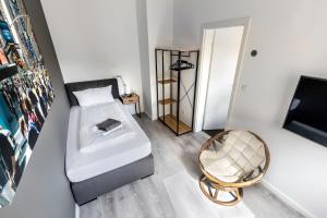 Postel nebo postele na pokoji v ubytování PRIMERA Zimmer mit Gemeinschaftsbad