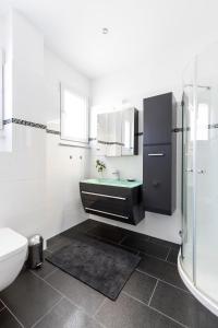 Ванная комната в PRIMERA Zimmer mit Gemeinschaftsbad