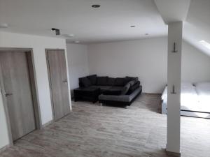 Posezení v ubytování Apartmán Vimperk + 1 fotografie