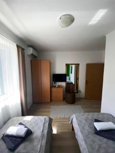 Posteľ alebo postele v izbe v ubytovaní Apartments Adaleta