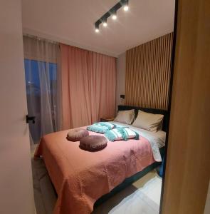 Tempat tidur dalam kamar di Apartament Jastrzębia Góra