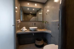 Łazienka w obiekcie Kalisperis Hotel