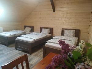 Posteľ alebo postele v izbe v ubytovaní Apartmány Kraš
