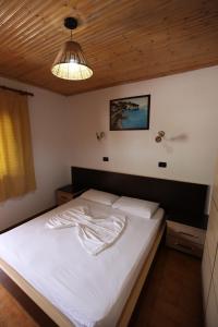 Postel nebo postele na pokoji v ubytování Hotel Colosseo