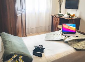 TV a/nebo společenská místnost v ubytování Hotel Da Gigi