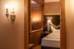 Łóżko lub łóżka w pokoju w obiekcie Hotel Hochfilzer