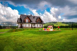 Κήπος έξω από το Czeho House Domki Białka Tatrzańska