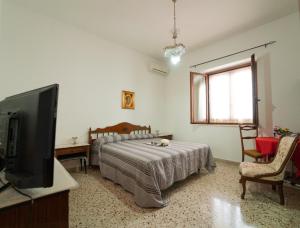 Krevet ili kreveti u jedinici u objektu Via San Bartolomeo primo piano e terrazzo