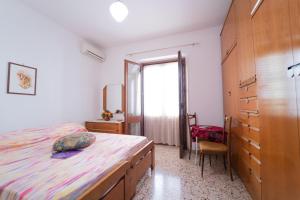 Krevet ili kreveti u jedinici u objektu Via San Bartolomeo primo piano e terrazzo
