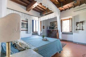 Posteľ alebo postele v izbe v ubytovaní Villa privata con piscina firenze chianti