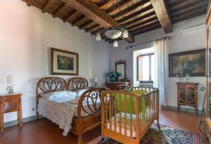 Posteľ alebo postele v izbe v ubytovaní Villa privata con piscina firenze chianti