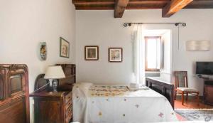 Posteľ alebo postele v izbe v ubytovaní Villa privata con piscina firenze chianti