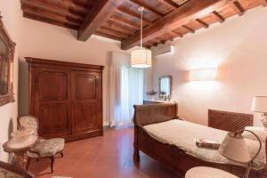 Posteľ alebo postele v izbe v ubytovaní Villa privata con piscina firenze chianti