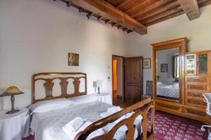 Posteľ alebo postele v izbe v ubytovaní Villa privata con piscina firenze chianti
