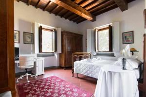 Posteľ alebo postele v izbe v ubytovaní Villa privata con piscina firenze chianti