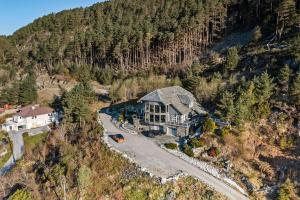 an aerial view of a house on a mountain at Utsikten in Kalvåg