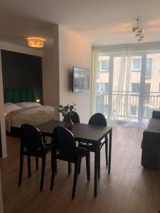 Et tv og/eller underholdning på Apartament 500 bulwary Stare Miasto Apartamenty No 1