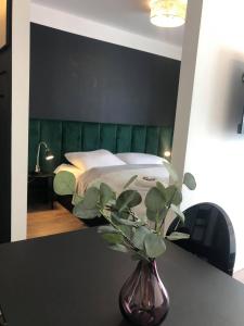 En eller flere senge i et værelse på Apartament 500 bulwary Stare Miasto Apartamenty No 1