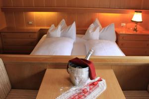 Postel nebo postele na pokoji v ubytování Albergo Alisander