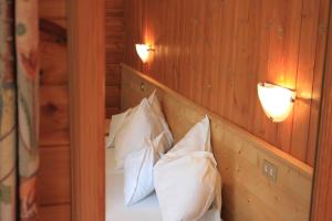 Postel nebo postele na pokoji v ubytování Albergo Alisander