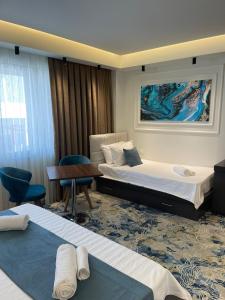 Postel nebo postele na pokoji v ubytování Apartments Jordan Luxury - Gevgelija