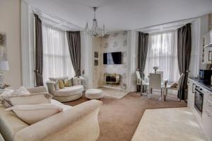 a living room with a couch and a table at Bunny Burrow in Whitby