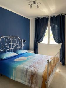 Ein Bett oder Betten in einem Zimmer der Unterkunft Villa Milù con Piscina