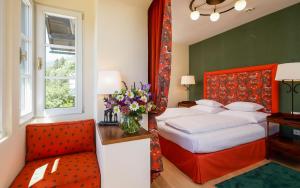 Giường trong phòng chung tại Der Knappenhof - Hotel & Restaurant