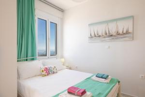 Posteľ alebo postele v izbe v ubytovaní SEPERI sea & sun