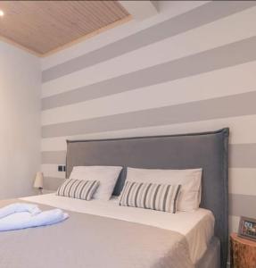 Ένα ή περισσότερα κρεβάτια σε δωμάτιο στο Zakynthos Flower of the East City house/aprtm