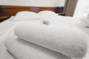 Posteľ alebo postele v izbe v ubytovaní Elita Hotel & Restauracja