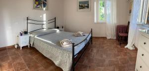 A bed or beds in a room at il Podere La Casina