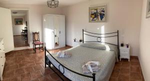 A bed or beds in a room at il Podere La Casina