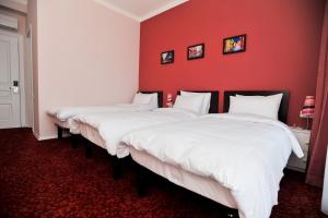 A bed or beds in a room at Piazza Four Colours